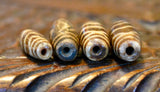 PUM 2   A Group of 4 Antique Pumtek Beads