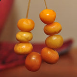 AC 106 Eight Antique Natural Amber Round Beads-Morrocco